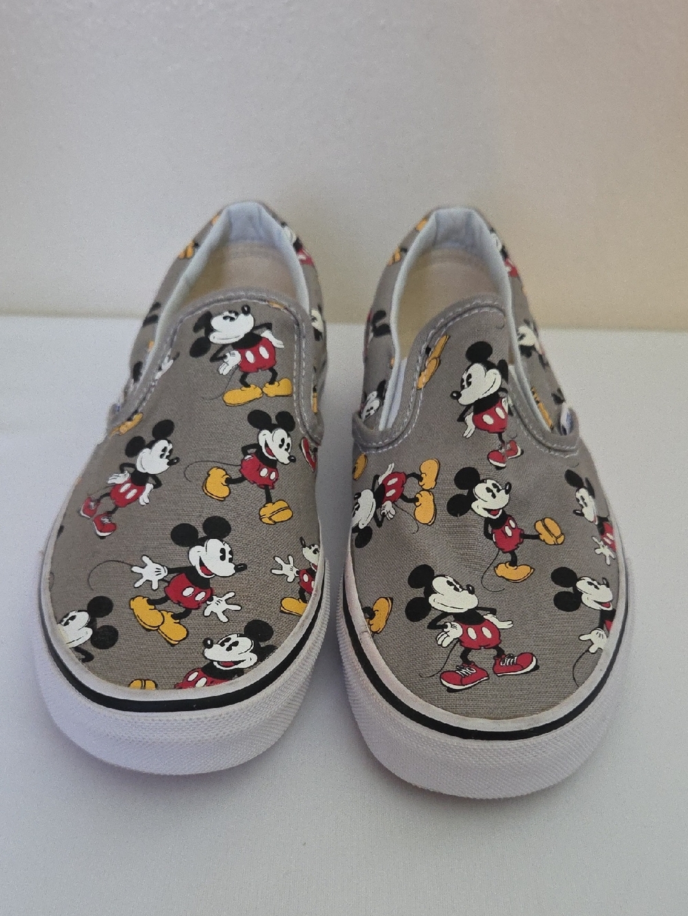 Vans Slip-On Sneakers in Gray with Mickey Print